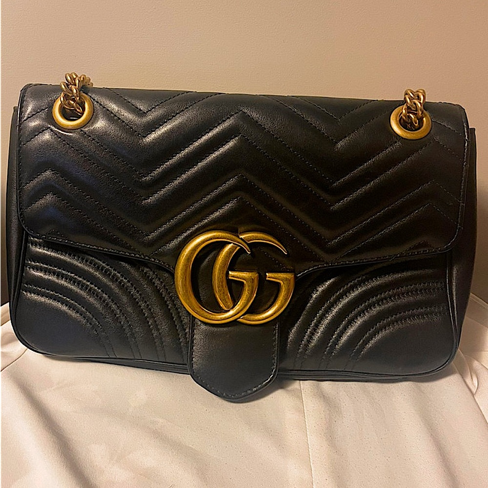 GUCCI MONAT PURSE Sold